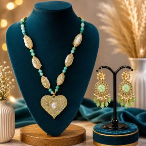 Green beaded heart pendant necklace set with matching earrings